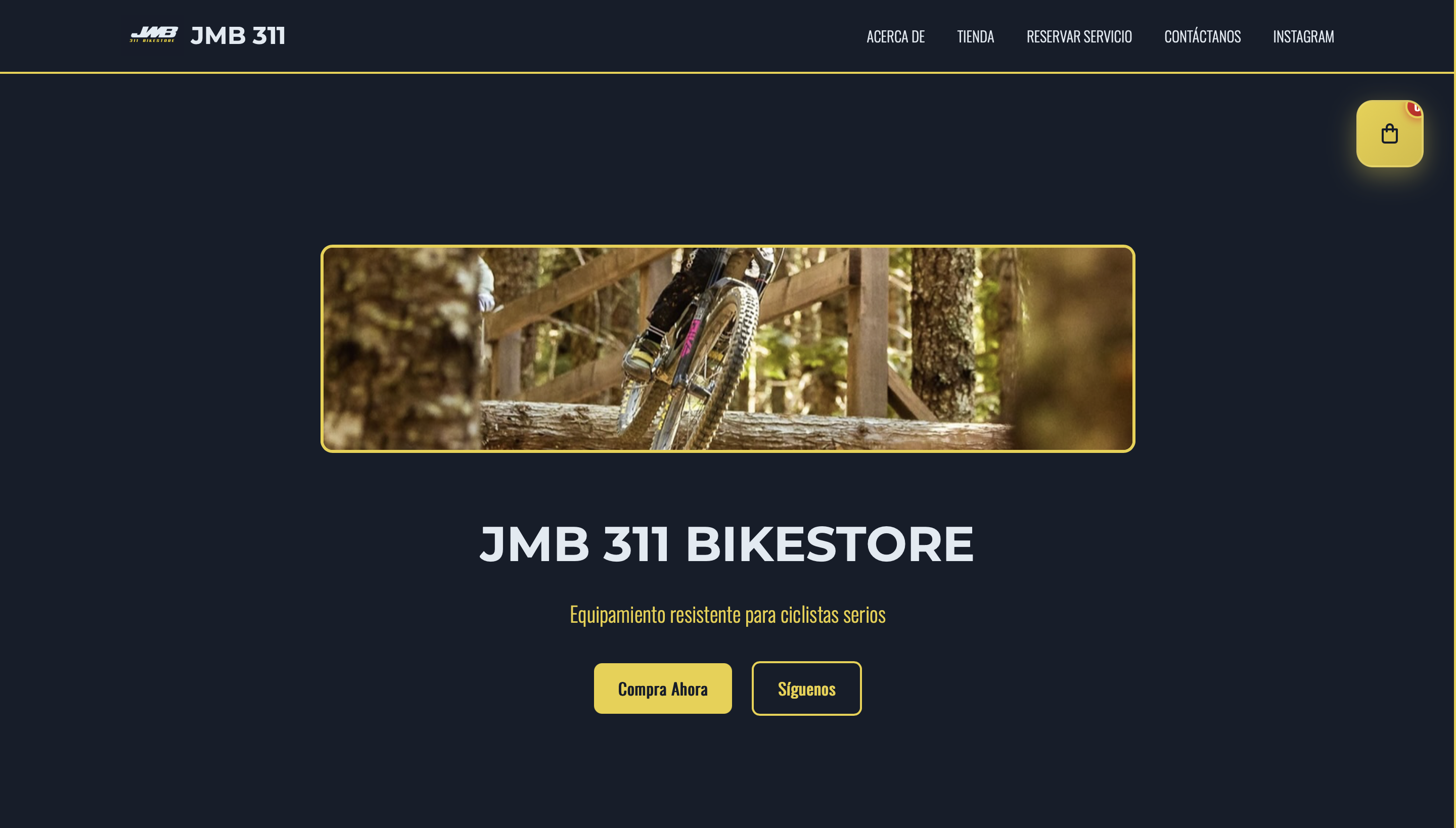 JMB311 bike shop website on a laptop